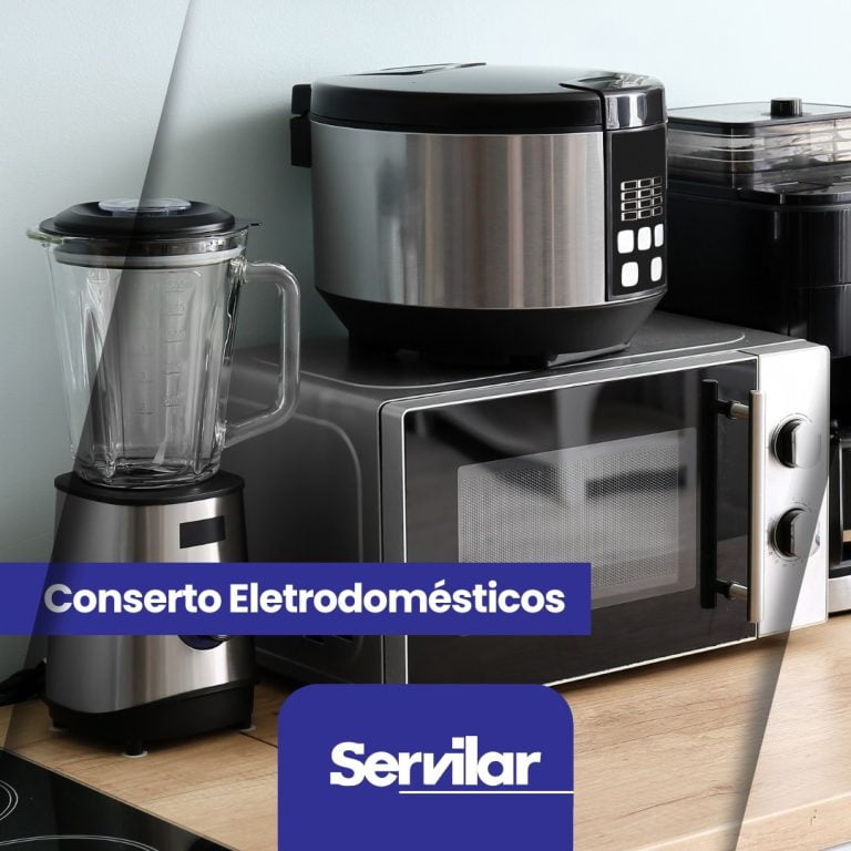 Conjunto de eletrodomésticos como liquidificador, micro-ondas e panela elétrica em cozinha, destacando o serviço de Conserto de Eletrodomésticos oferecido pela Servilar em Tubarão.